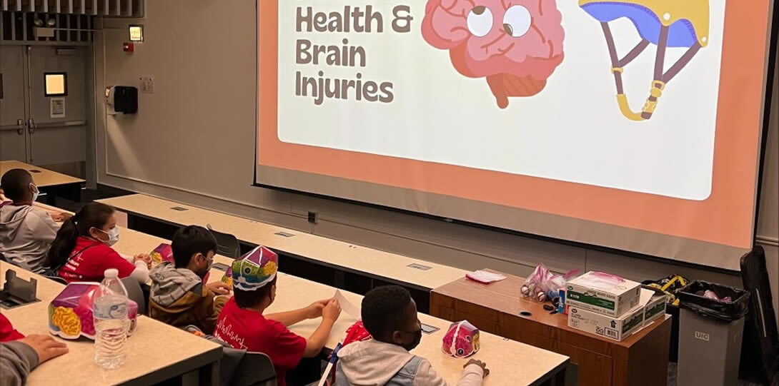 Students learning about public health and brain injuries